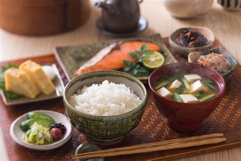 Japanese breakfast foods - Rice. Miso soup. Grilled fish such as salmon or mackerel. Pickles such as cucumber, plums, and radishes. Other possible dishes include natto (fermented soybeans), raw egg (to put on rice), and tamagoyaki (rolled omelet) Going out for breakfast isn’t as common in Japan as in some other Asian and Western cultures.